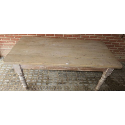 893 - An antique pine kitchen table painted with a light wash of grey and distressed on baluster turned su... 