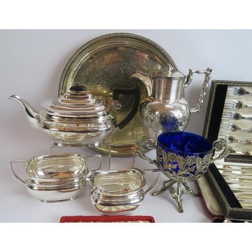 107 - A mixed lot of mainly antique silver plated wares including a three piece tea set, salver, hot water... 