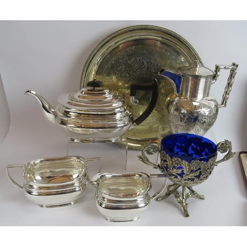 107 - A mixed lot of mainly antique silver plated wares including a three piece tea set, salver, hot water... 