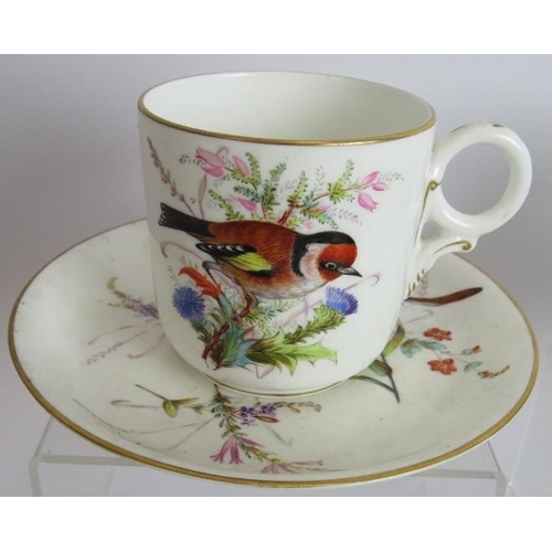 116 - An antique hand decorated cup and saucer with birds in foliage marked 'Padmore Derbyshire Fort Royal... 