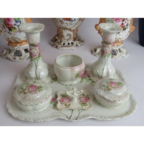 117 - An antique Czechoslovak porcelain dressing table set, a continental three piece hand decorated Garni... 