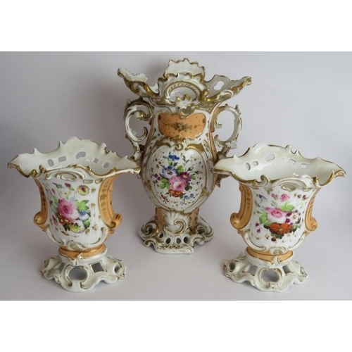 117 - An antique Czechoslovak porcelain dressing table set, a continental three piece hand decorated Garni... 