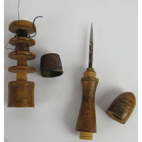 129 - A 19th century needlework combination tool, a quantity of lace bobbins, a box of boot buttons and tw... 