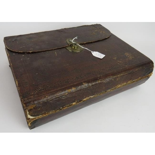 139 - A 19th century leather bound travelling writing slope with fitted interior and an Indo-Persian inlai... 