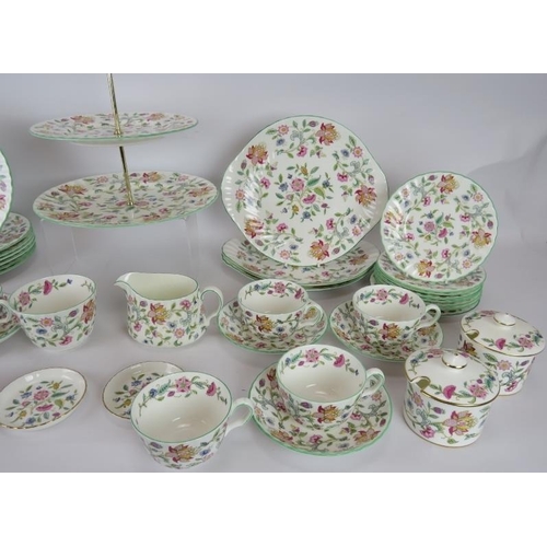 142 - A 40 piece Mintons tea set in Haddon Hall pattern including plates, cake stand, jam pots, jug, sugar... 