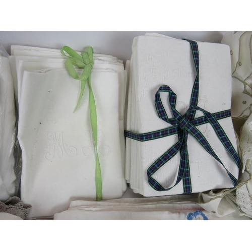 147 - A quantity of good quality table linen including monogrammed napkins and embroidered napkins and tab... 