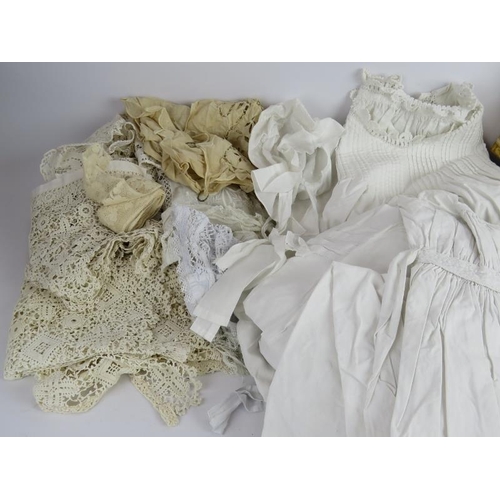 150 - A quantity of antique linen and tapestry including night dresses, christening gowns, lace, cloths et... 