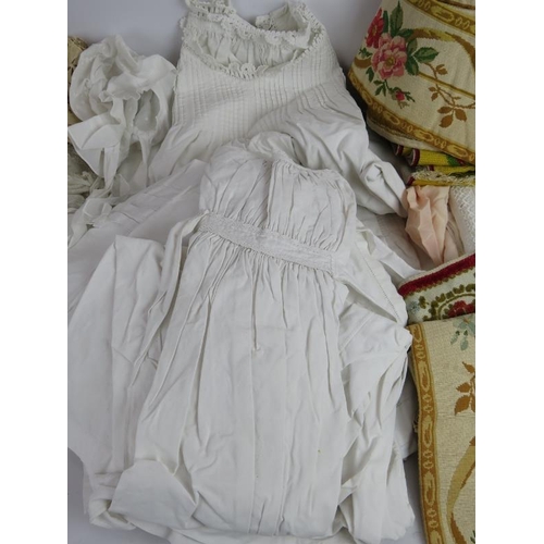 150 - A quantity of antique linen and tapestry including night dresses, christening gowns, lace, cloths et... 