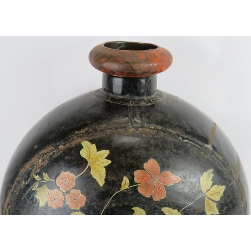 172 - A large Eastern metal flask shaped metal vase with hand painted floral decoration. Height 60cm. Diam... 