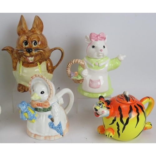 180 - Seven novelty teapots formed as various animals including frogs, rabbit, mouse, duck and tiger. Tall... 