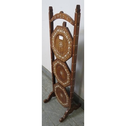 190 - An antique hardwood Hoshiapur three tier folding cake stand, featuring bone inlay in the Moorish tas... 