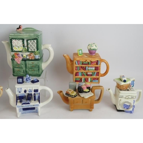 192 - Eight mixed novelty teapots in the form of various kitchen appliances and furniture. Tallest 18cm. (... 