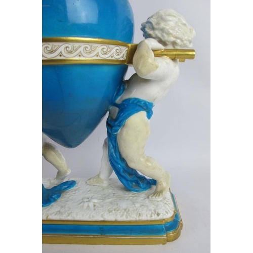 195 - A 19th century Mintons porcelain vase in the form of two putti carrying an urn. White and turquoise ... 