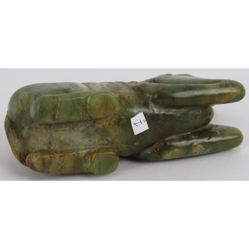 206 - A Chinese carved spinach Jade recumbent horse, Ming style but likely Qing, 16cm long x 10cm high.
Pr... 