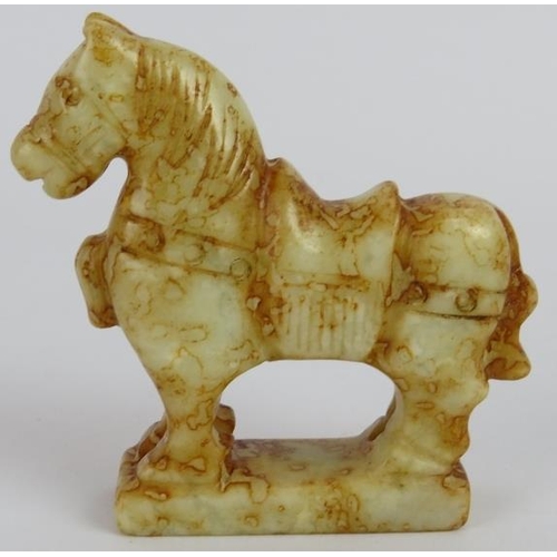 214 - A Chinese carved russet Jade standing horse, with saddle, on plinth base, Ming style but likely Qing... 