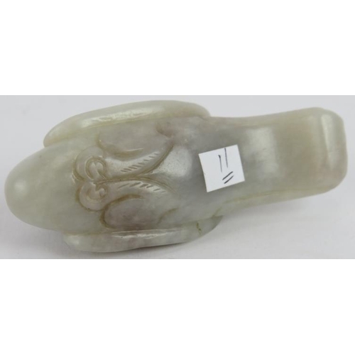 216 - A Chinese carved pale celadon Jade Phoenix, Ming style but likely Qing, 8cm long x 4cm high.
Provena... 