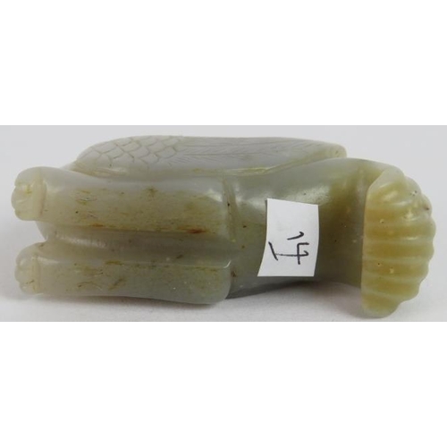 219 - A Chinese carved celadon, pale celadon and russet Jade Phoenix, Ming style but likely Qing, 6cm long... 