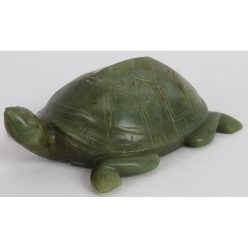 221 - A Chinese carved spinach Jade turtle, Ming style but likely Qing, 10cm long x 4cm high.
Provenance: ... 