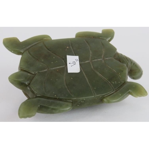 221 - A Chinese carved spinach Jade turtle, Ming style but likely Qing, 10cm long x 4cm high.
Provenance: ... 