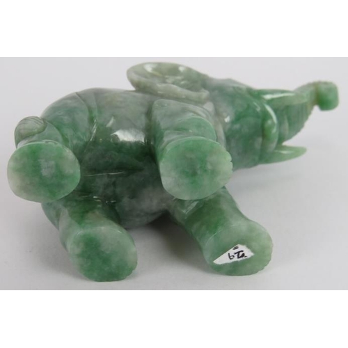 234 - A Chinese carved Mottled Jade elephant, Ming style but likely 20th century, 7cm high x 9cm long.
Pro... 