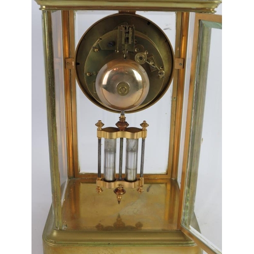 247 - A brass cased striking mercury pendulum mantel clock with white enamel dial. Movement number 8773. K... 