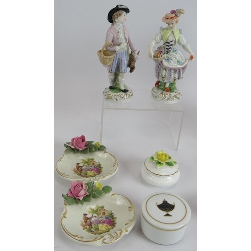 255 - A collection of Dresden and other porcelain including two pairs of figures, a single figure, two pai... 