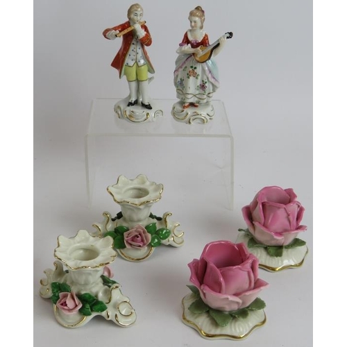 255 - A collection of Dresden and other porcelain including two pairs of figures, a single figure, two pai... 