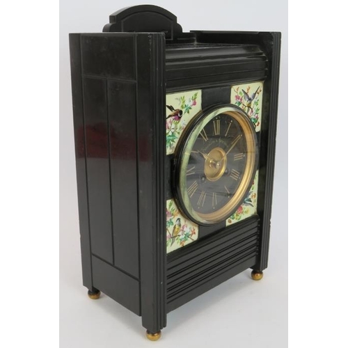 261 - A Victorian slate striking mantle clock in the aesthetic movement taste with hand painted porcelain ... 