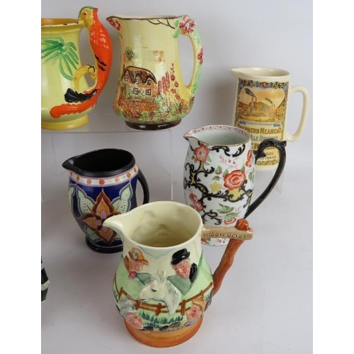 268 - Nine antique and vintage collectable pottery jugs including a musical Widecombe Fair jug, Crown Devo... 