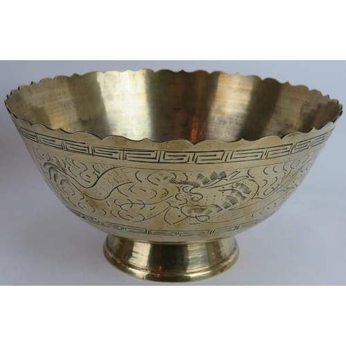 273 - A finely decorated Indo-Persian brass Jardinière, two repousséd Eastern bowls, a turned brass Chines... 