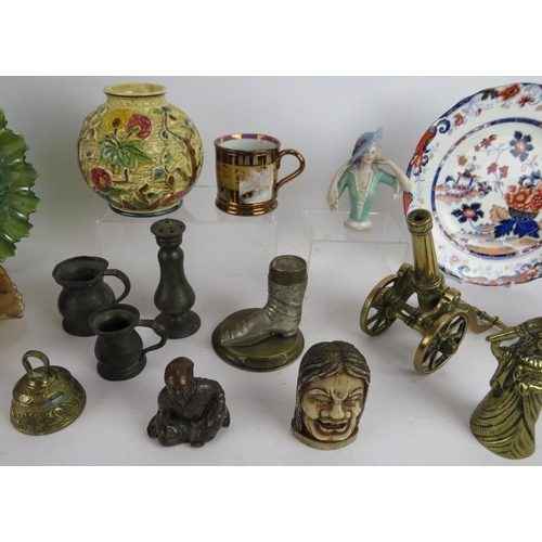 282 - A mixed lot of collectables including carnival glass, pewter, pottery, brassware and two Japanese st... 