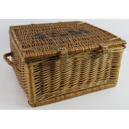 284 - A Fortnum and Mason wicker picnic hamper with leather straps. 38cm x 38cm x 20cm.
Condition report: ... 