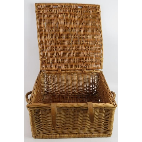 284 - A Fortnum and Mason wicker picnic hamper with leather straps. 38cm x 38cm x 20cm.
Condition report: ... 