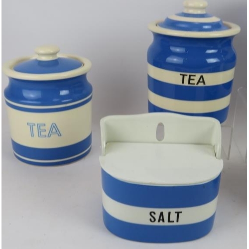 293 - Five T.G. Green blue Cornish ware storage jars including sugar, raisins, currants and tea, a butter ... 