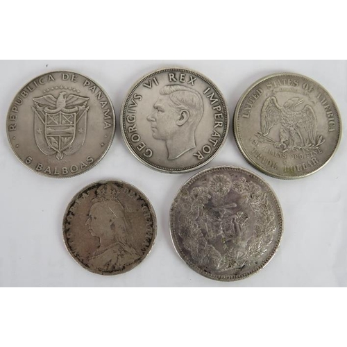 296 - A US Trade Dollar 1877, Japanese silver one Yen (over struck), Panama 5 Balboas, Victorian silver Fl... 