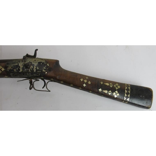 3 - An antique Afghan percussion cap Jezail rifle with mother of pearl inlaid stock. Overall length 162c... 