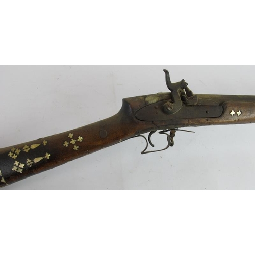 3 - An antique Afghan percussion cap Jezail rifle with mother of pearl inlaid stock. Overall length 162c... 