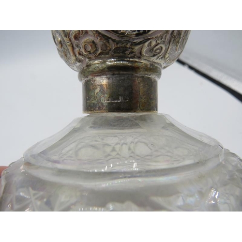 320 - Two large hobnail cut scent bottles with silver embossed tops. London 1893 and one with worn hallmar... 