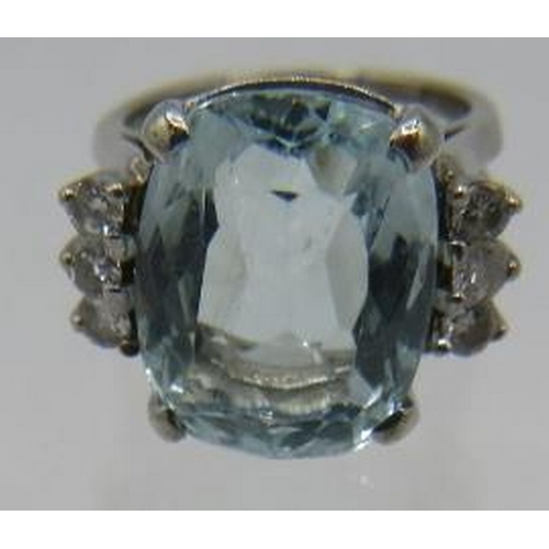 334 - A large cushion cut aquamarine and diamond ring, aquamarine 15mm x 12mm, diamond shoulders consistin... 