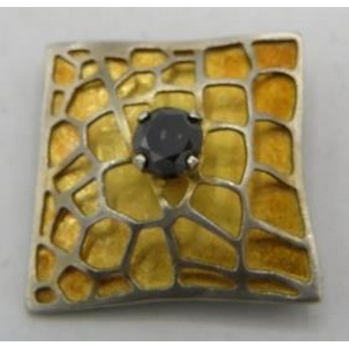 336 - A black diamond set in white metal gilded square pendant, approx 25mm across, approx 0.75cts with in... 