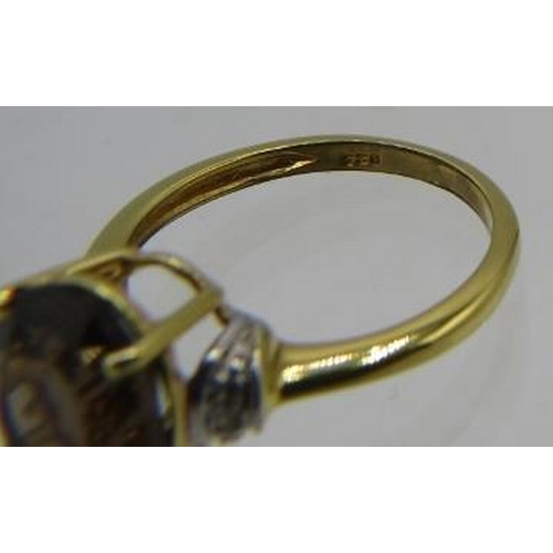 354 - Smoky Quartz solitaire ring. Size N/O. Yellow gold and sterling silver.
Condition report: Excellent.