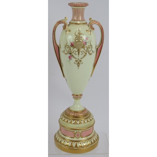 37 - An Edwardian Royal Worcester Pate-sur-pate urn vase with gilt and pink decoration over an ivory grou... 