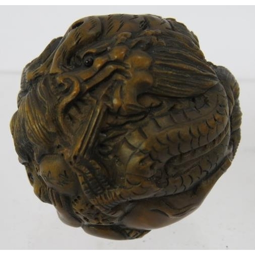 39 - Six carved hardwood Chinese Netsuke including one intricately carved ball. Five are signed. (6).
Con... 