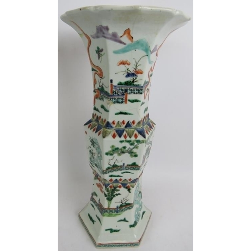 41 - An antique Chinese porcelain vase of flared hexagonal form with central knop, decorated in coloured ... 