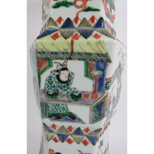 41 - An antique Chinese porcelain vase of flared hexagonal form with central knop, decorated in coloured ... 