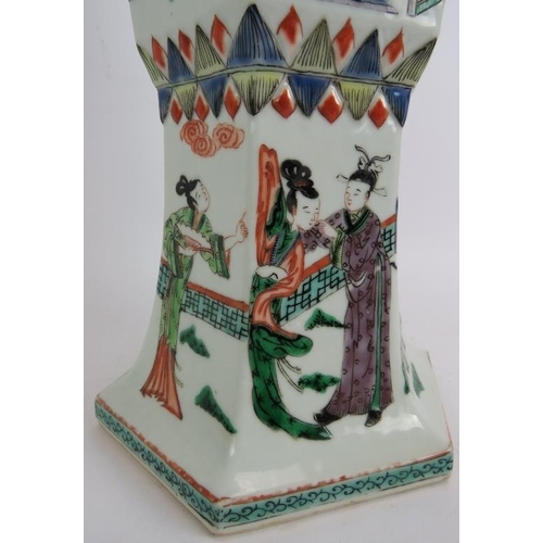 41 - An antique Chinese porcelain vase of flared hexagonal form with central knop, decorated in coloured ... 