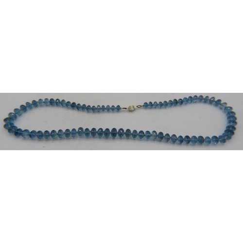 418 - A striking faceted blue topaz bead necklace, contemporary but with a hint of Art Deco revival, boxed... 