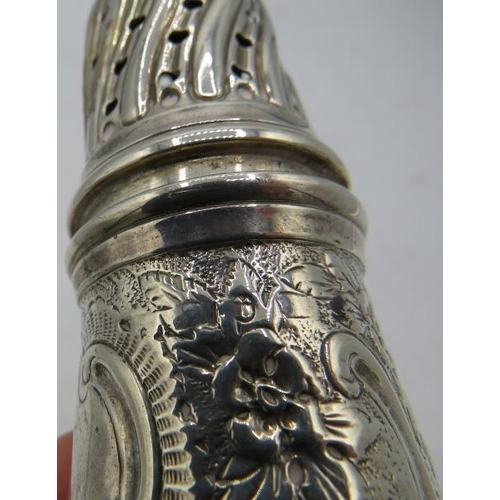 437 - A mid 19th century silver sugar caster with hunting and embossed scrolls and flowers. Hallmarks worn... 