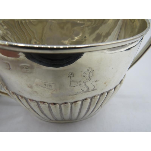 438 - A silver jug and matching sugar bowl with half fluting decoration. Birmingham 1878. 5.2 troy oz/162 ... 