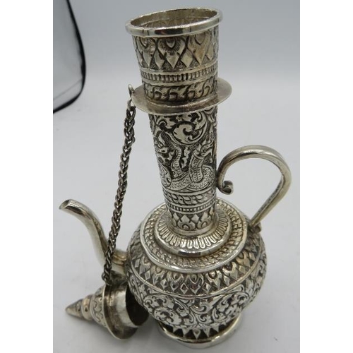 442 - A white metal Eastern jug with detachable lid. Possibly for rose water. 3.2 troy oz/100 grams.
Condi... 